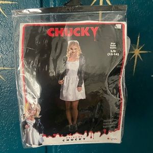 Large bride of chucky costume. Only worn once. Comes with a veil and jacket.